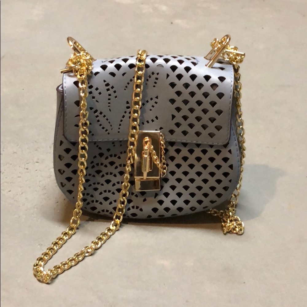 Periwinkle Perforated Purse